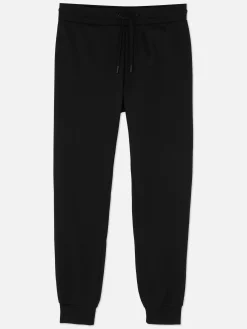 Eng Geschnittene Jogginghose