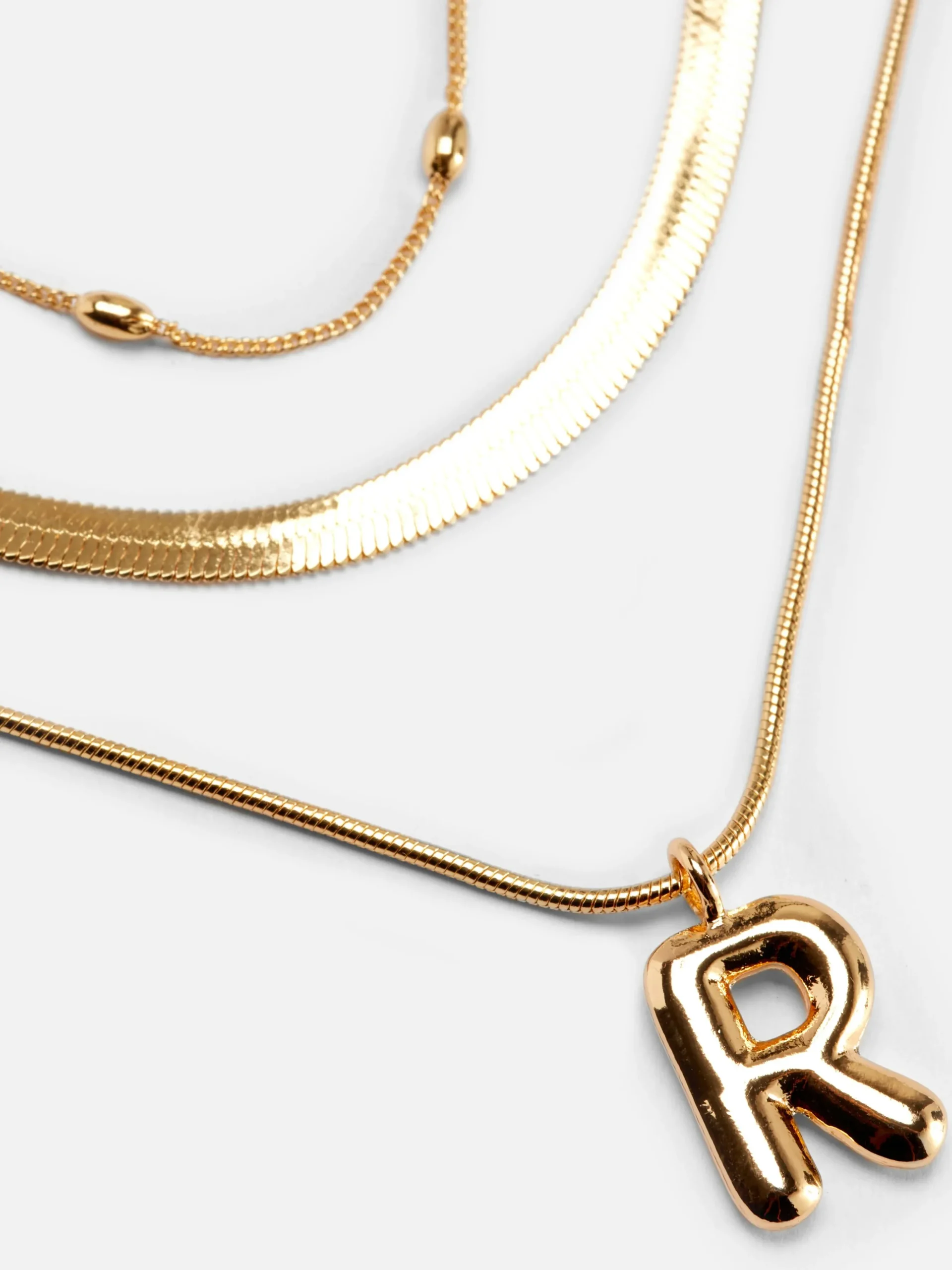 Mehrlagige Halskette Mit Gesteppter Initiale