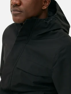 Regenmantel Mit Kapuze Und Durchgehendem Reißverschluss