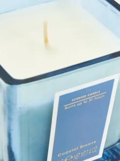 Viereckige Kerze In Getöntem Glas